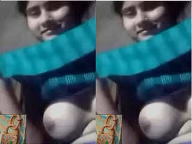 Amateur girl with cute boobs shows off in exclusive video