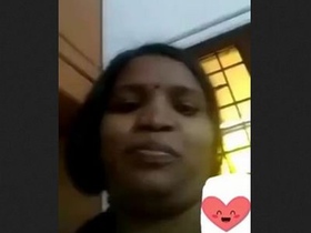Indian aunt displays her large breasts and vagina