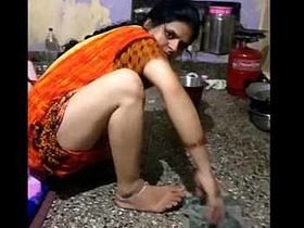Bhabhi Janaki shows off her sexy thighs in a cute housewife outfit