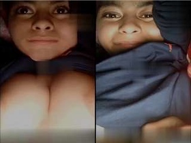 Indian girl flaunts her big boobs in a steamy bathroom
