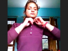 Village beauty reveals her cleavage