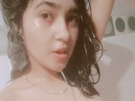 Teen girl in bathroom takes naked selfies
