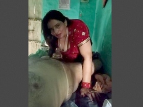 Desi village bhabhi rides dick and gives handjob