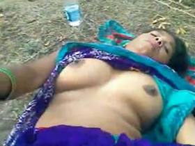 Mature bhabhi in blue sari enjoys open field sex with MMC