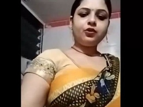 Sensual sari-clad Indian woman pleasuring herself with Julie