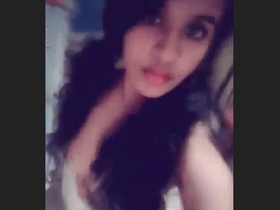 Indian woman records herself satisfying her partner in a sensual recording