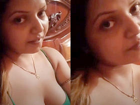 Indian girl with large breasts performs live