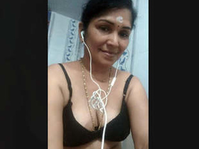 Indian wife strips and shows off her body in video
