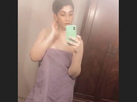 A Pakistani wife displays her attractive figure