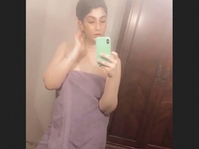 A Pakistani wife displays her attractive figure
