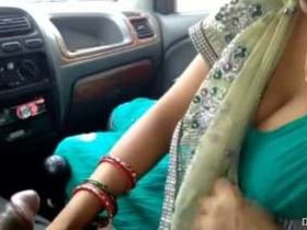 Desi MILF aunty gives a blowjob in the car