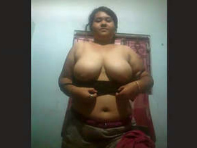 Boudi, the attractive dairy farmer, records a sensual film for her significant other