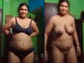 Elderly wife reveals her nude form on camera, featuring a voluptuous figure
