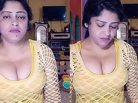 Indian aunt reveals her bosom during a live broadcast