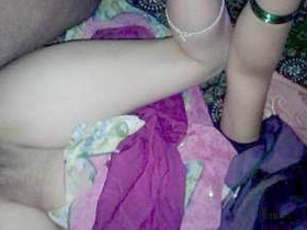 A seductive woman performs oral sex while her boyfriend fondles her breasts and genitals