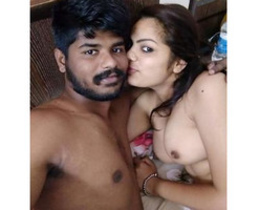A passionate Indian couple engages in intimate sexual activities