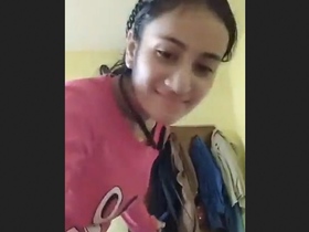 Cute Indian girl displays her tight ass for the camera
