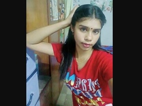 Young girl strips down to reveal her horny desires