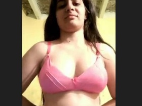 Indian teenage girl reveals her large breasts