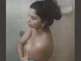 Desi beauty indulges in a sensual bathing session in new video