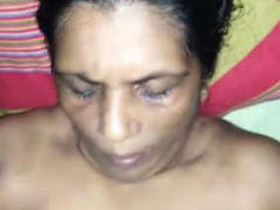 Mature woman gives a handjob and receives cum on her breasts