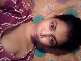 Cute Indian girl flaunts her small tits in a steamy video