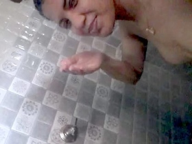 Indian girl captures selfies while taking a bath