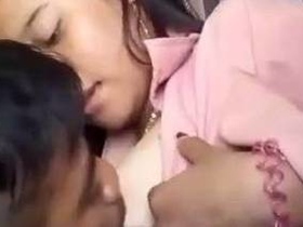 Watch a hot girl sucking boobs and nipples in MMS video