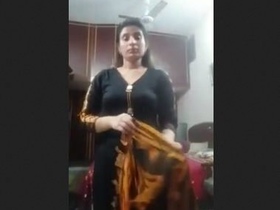 Busty wife flaunts her curves in a full nude video