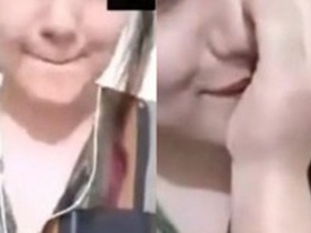 Pakistani girl indulges in self-pleasure by sucking her breasts