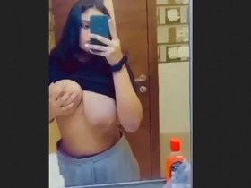 Stunning Pakistani beauty fondling her ample bosom