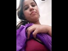 Watch a cute Indian girl show off her big boobs in a steamy video