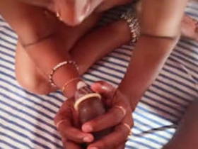 A Desi woman gives oral sex and engages in intercourse