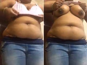 Indian amateur Tamil girl unveils her big breasts in exclusive video