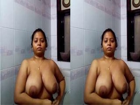 Exclusive video of a bhabhi showing off her big boobs
