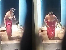 Village wife's hidden cam video of topless bathing and big breasts