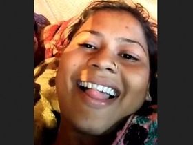 Waafiyah, an Indian woman with large breasts, displays them in a rural setting