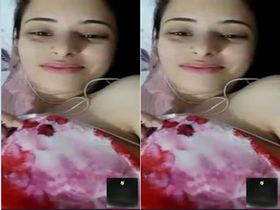 Exclusive video of cute Indian girl masturbating with her boobs on display
