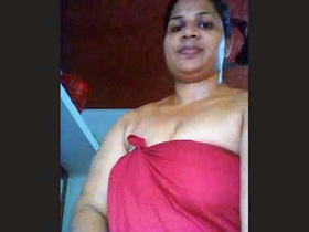 Big-breasted Indian wife from Malayalam region performs on camera