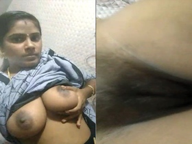 Mallu bhabhi flaunts her big boobs and pussy on camera