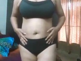 Aroused middle-aged Indian woman misbehaves on film
