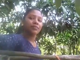 A village girl from Bangladesh indulges in naughty behavior while taking a bath