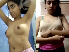 Cute Indian girl strips and bathes in a tub