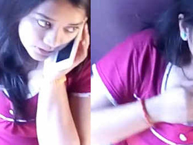 Cute Indian college girl scratches boob on light train without nudity
