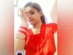 A newly married couple's video call where the wife changes outfits