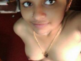 Man assists Indian babe in removing clothes and engages in sexual activity on the floor