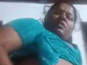 Tamil aunty from the neighborhood enjoys solo play with dildo