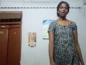 Watch a mature Tamil woman strip down in solo video