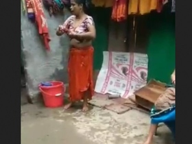 Married woman changes saree while bathing