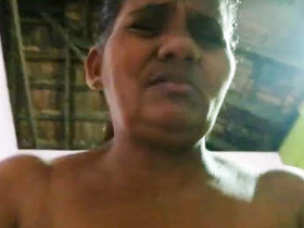 Mature aunty gets turned on and shows her boobs